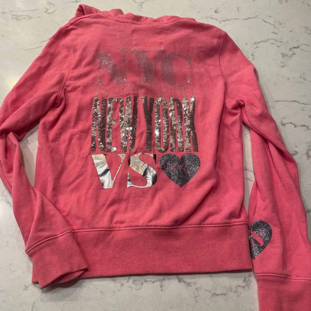 Pink and silver sequined Victoria’s Secret zip-up hoodie from NYC